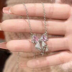 Elegant Pink and Silver Bow Necklace